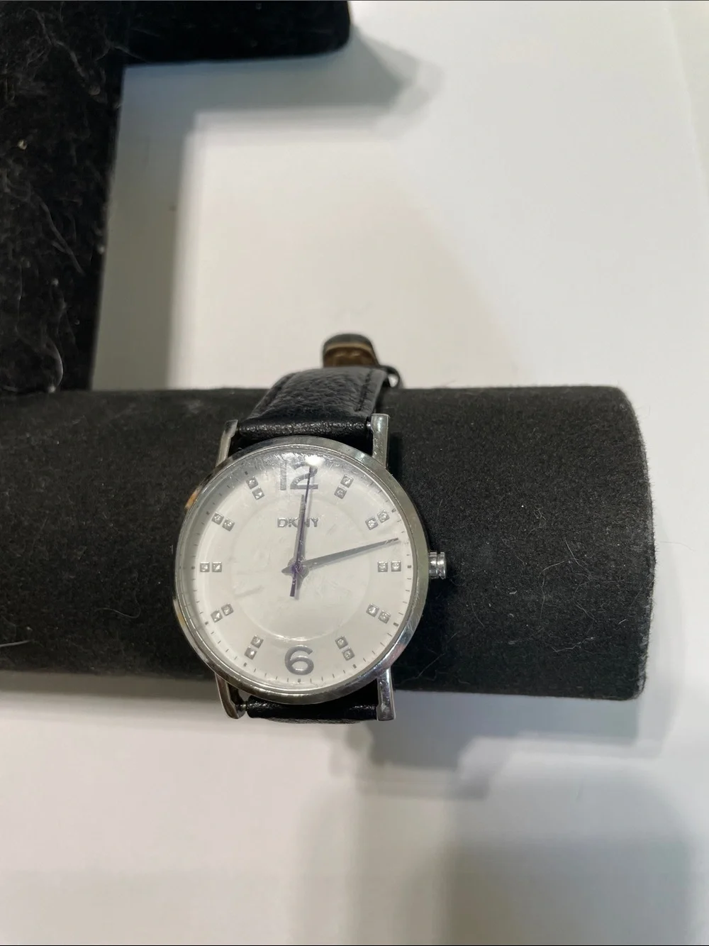 Works.  DKNY Watch.  White Face Dial, Black Leather Strap. eBay -$33